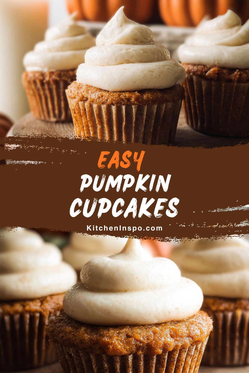 Moist pumpkin cupcakes topped with swirls of creamy frosting are arranged on a wooden surface, making festive fall cupcakes that are a cozy favorite in seasonal pumpkin recipes.